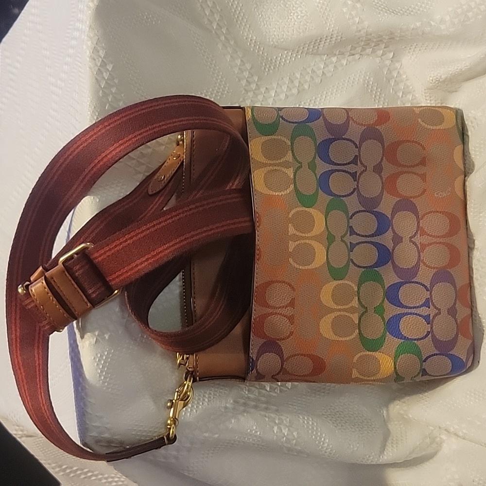 Coach tan an multi color bag